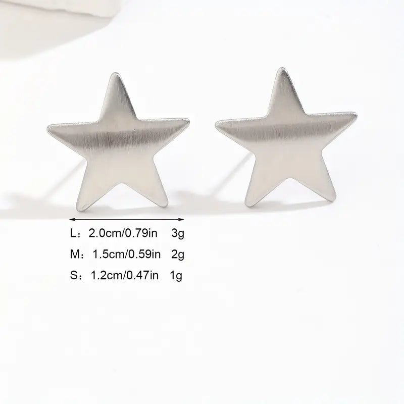 AROS ACERO QUIRURGICO ESTRELLAS PLATEADAS.