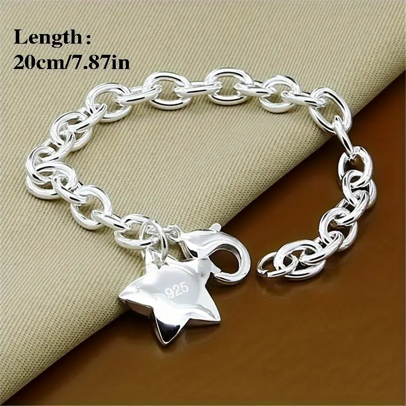 PULSERA ACERO QUIRURGICO GRUESA BAÑADA EN PLATA ESTRELLA.