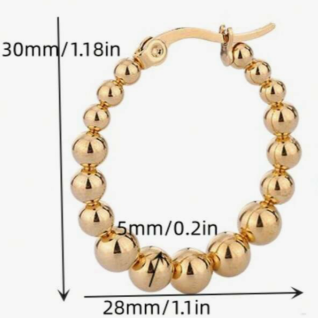 ARGOLLAS DE ACERO QUIRÚRGICO BOLITAS DORADAS.