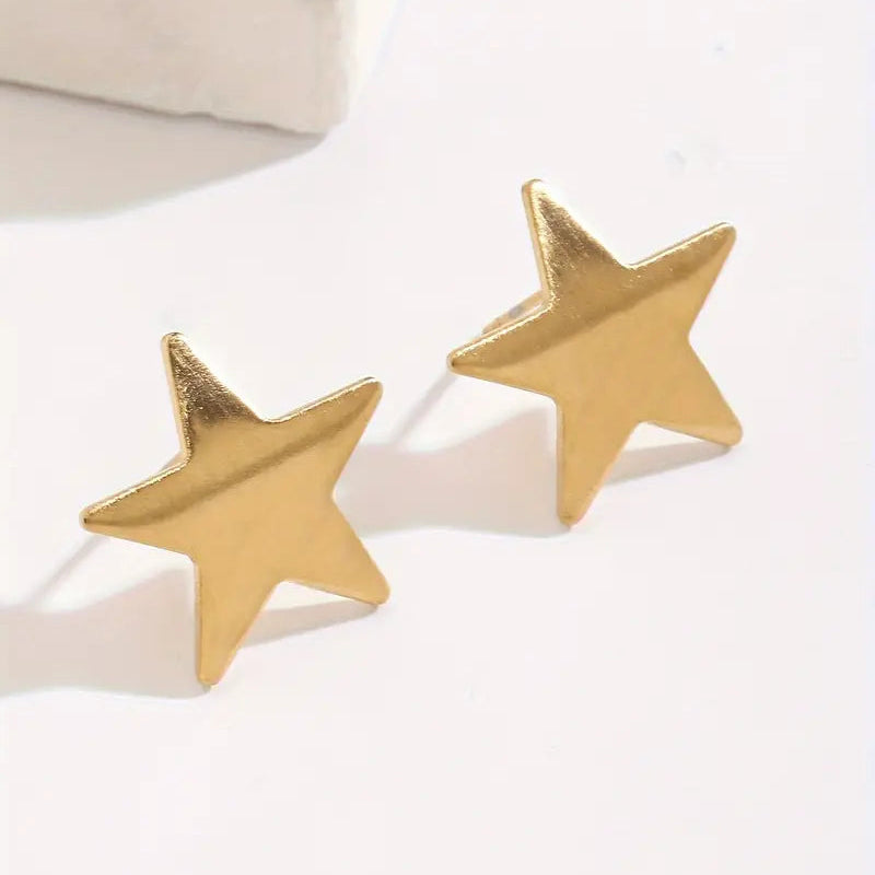 AROS ACERO QUIRURGICO ESTRELLAS DORADAS.