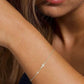 PULSERA CRUZ CIRCÓN PLATA