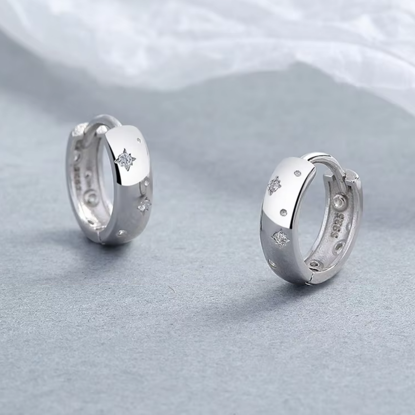 ARGOLLAS DE PLATA DESTELLOS.