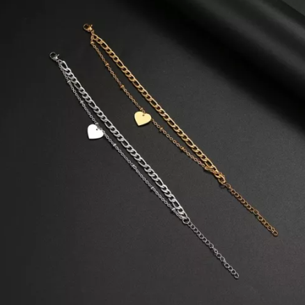 PULSERA ACERO QUIRÚRGICO DOBLE CORAZÓN PLATEADO.