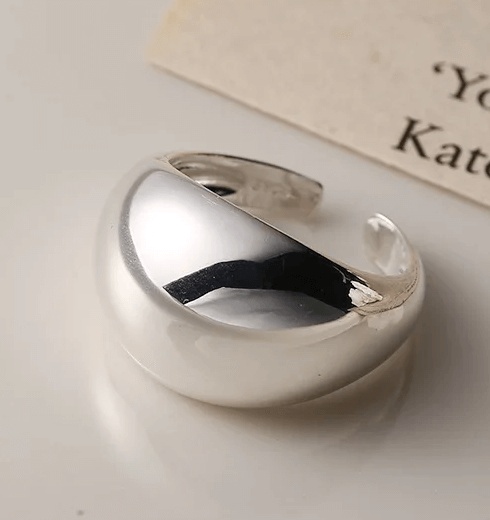 ANILLO DE ACERO QUIRÚRGICO AJUSTABLE GRUESO PLATEADO.