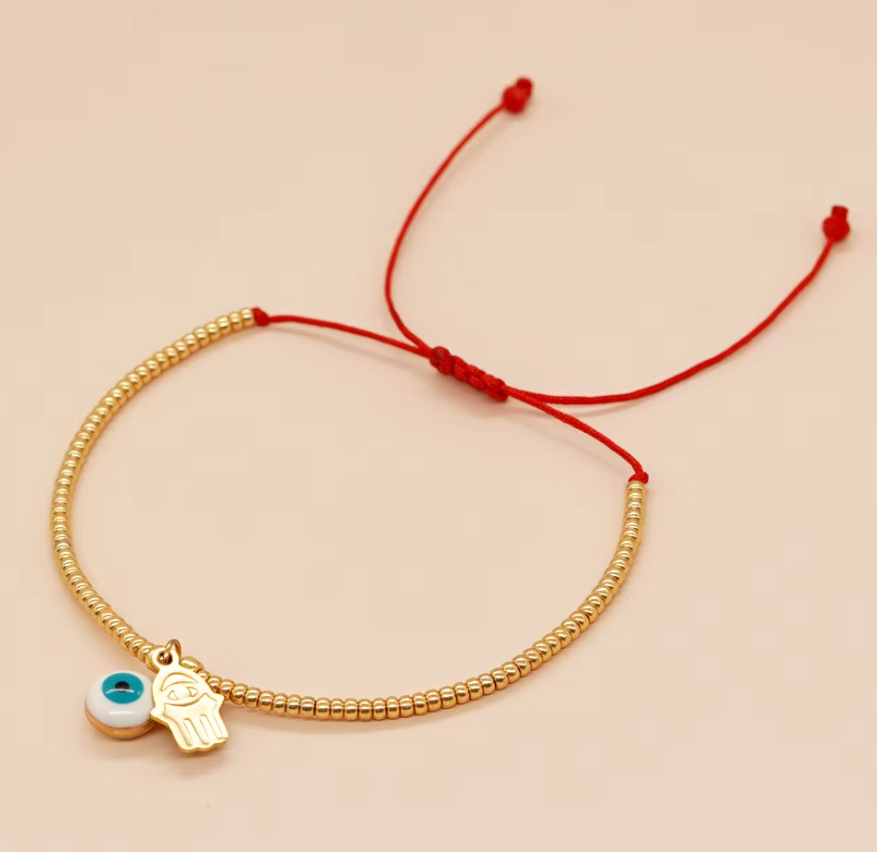 PULSERA MIYUKI DORADA OJO Y MANO