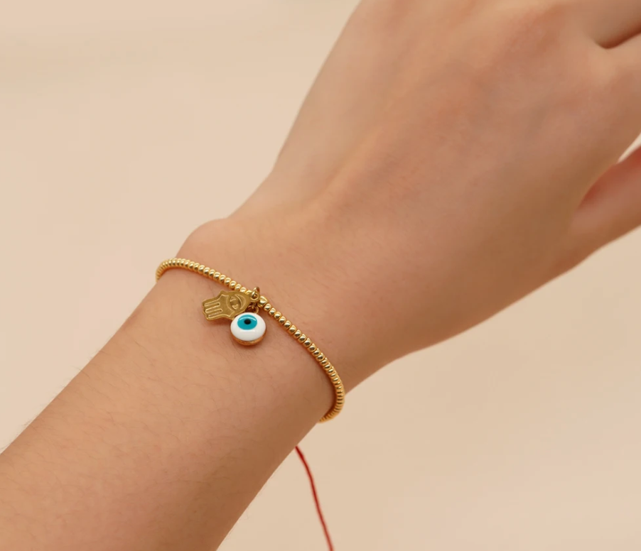 PULSERA MIYUKI DORADA OJO Y MANO