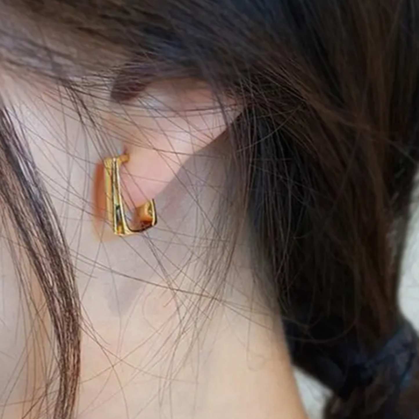 ARGOLLAS ACERO QUIRUGICO CUADRADOS DORADOS